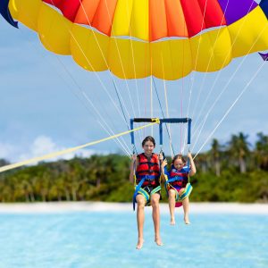 a parachute with a body of water