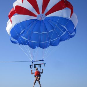 a parachute with a body of water