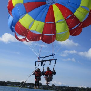 a parachute with a body of water