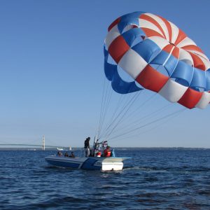 a parachute with a body of water