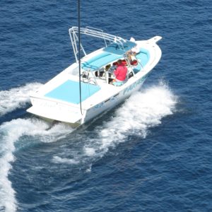 a small boat in a body of water