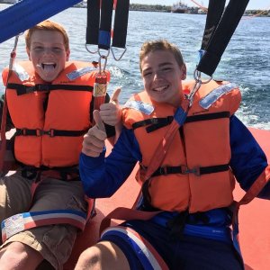 a couple of people that are sitting on a boat