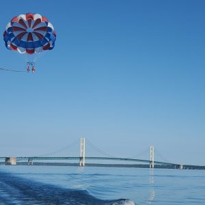 a parachute with a body of water